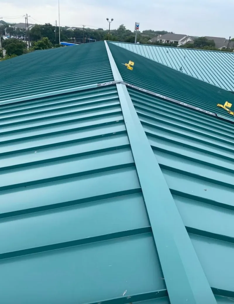 Green commercial metal roof ridge and valley for Metal Roof Repair in New Kingman-Butler